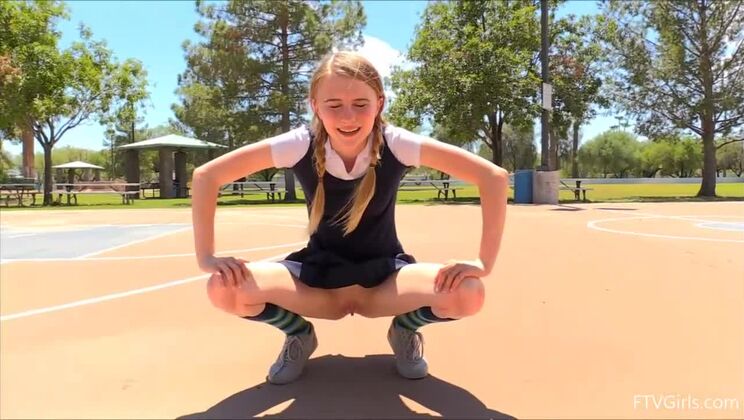 Blonde Cutie Sharlotte in Outdoor Pigtails