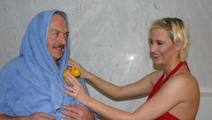 Blonde Bombshell Takes A Wash