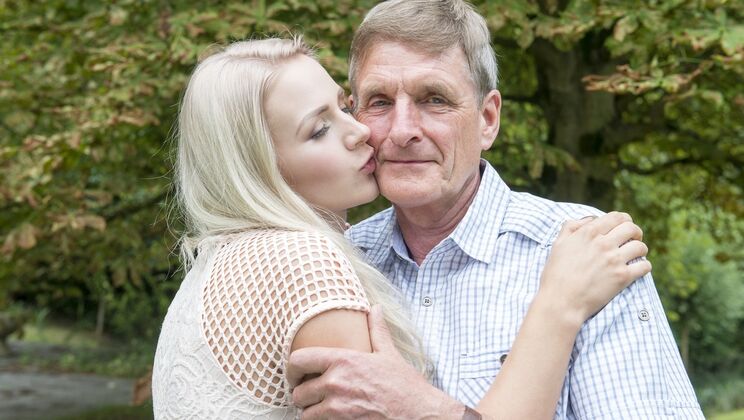 Outdoor Close Up of Old Man and Young Leaf
