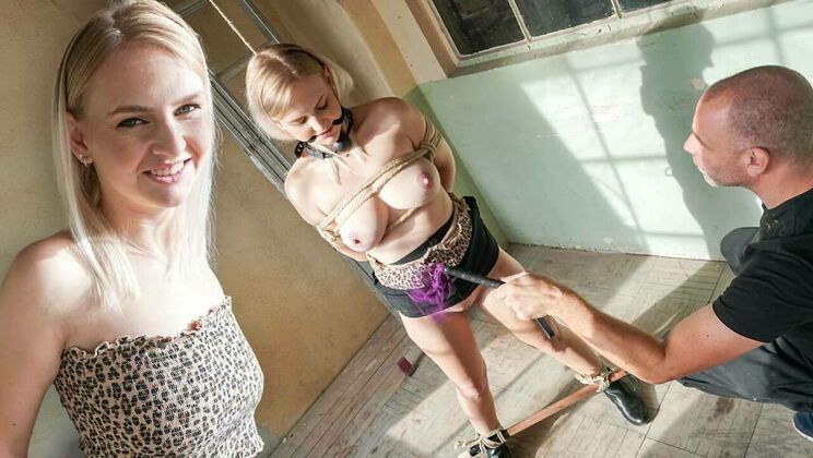 Kirsty's shaved pussy in domination play